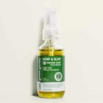 A bottle of Green Gorilla™ full spectrum CBD hemp oil for horses with a green label