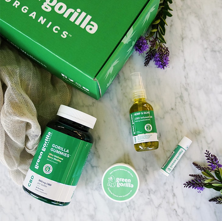 Green Gorilla™ human and animal CBD products on a countertop.