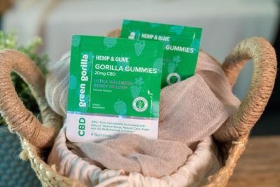 Two single-serving CBD gummy packs in a basket