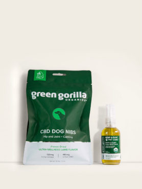 Bag of Green Gorilla™ CBD dog nibs with a bottle of 2400mg full spectrum CBD oil for pets.