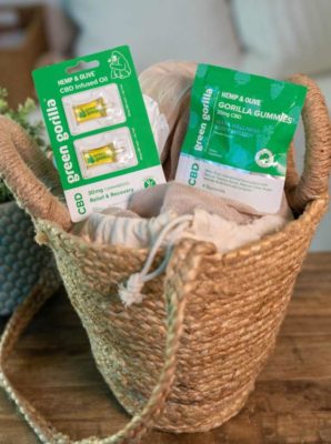 A basket with single-serving CBD oil and gummies